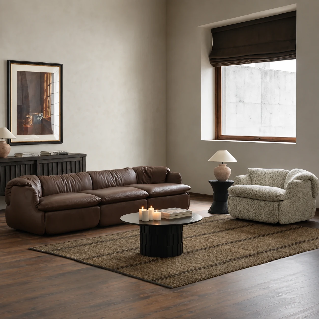 Brown leather Hisoka sofa and patterned Hisoka lounge chair arranged around a black Futamaru low table